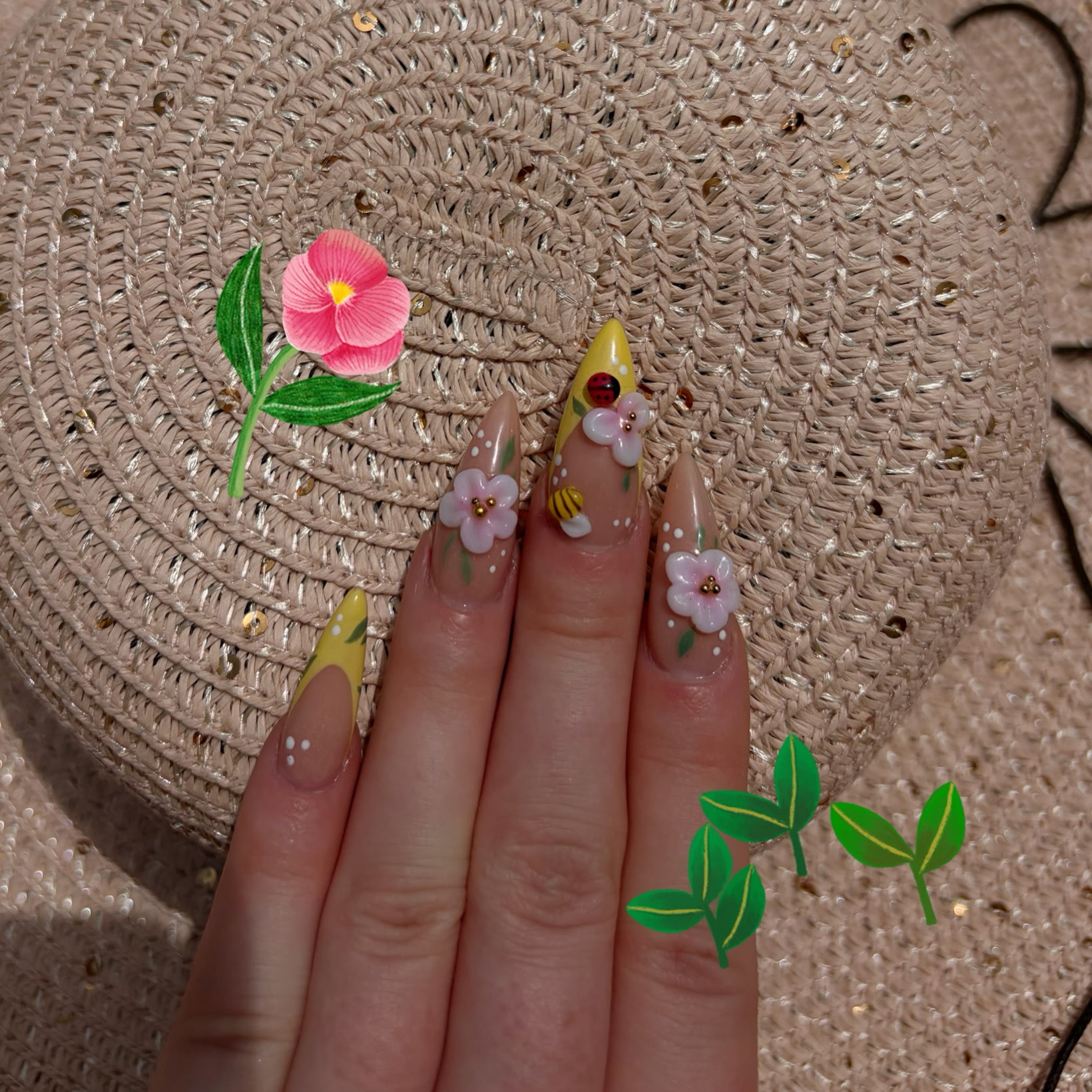 Almond nails with hand-painted flowers and 3D floral art